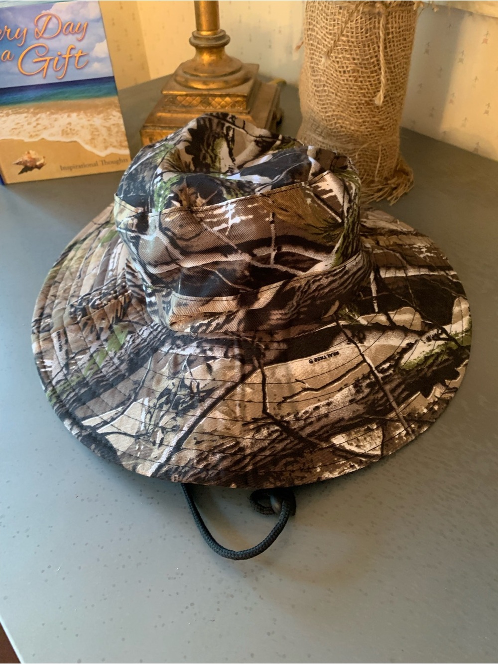 REALTREE camouflage pattern boonie hat, great for hunting and fishing.
